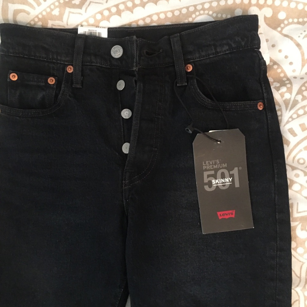 Button fly skinny distressed Levi’s 501 jeans